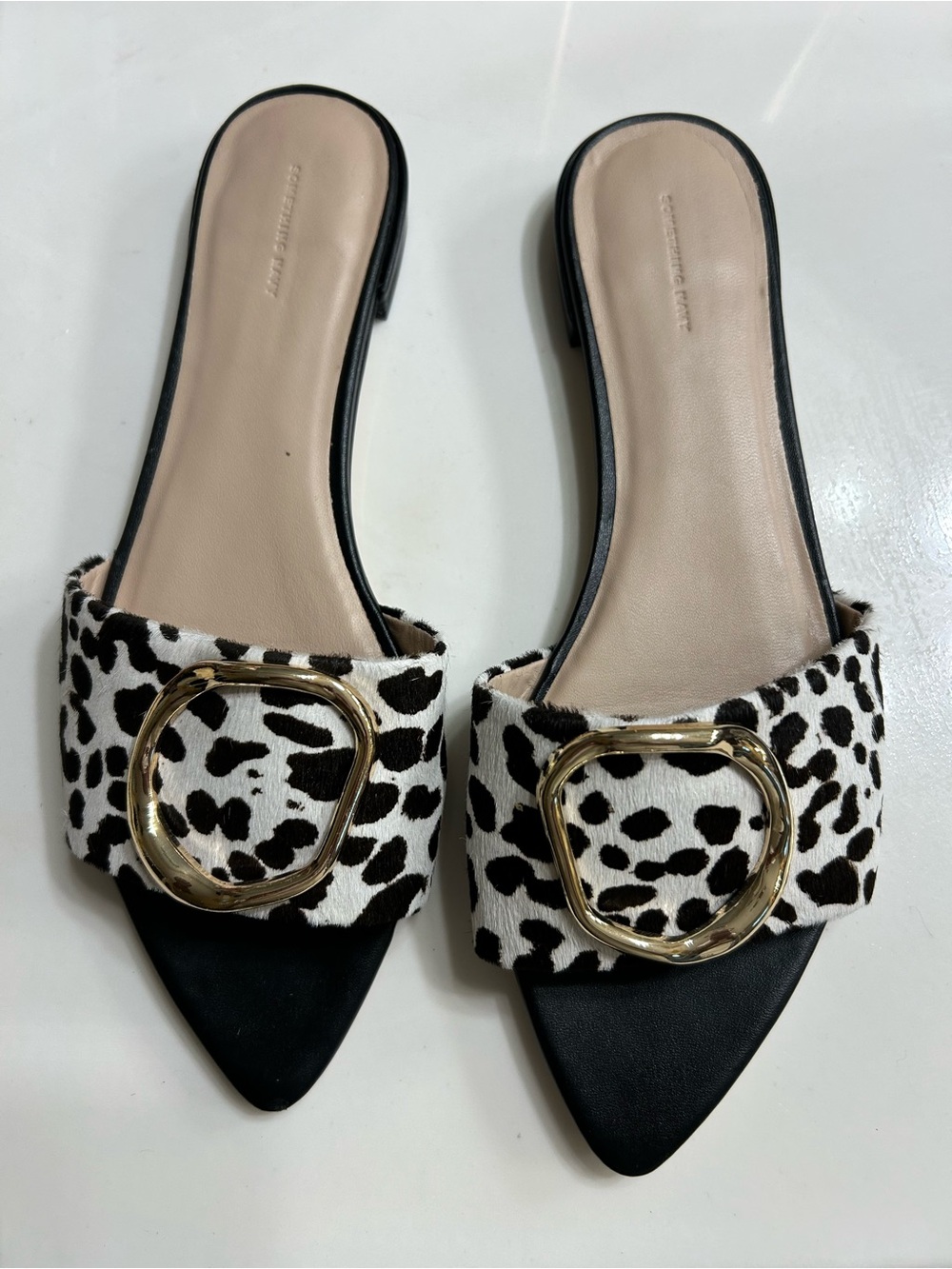 Something Navy Black and White Leopard-Print Slide Mules with Gold Buckle